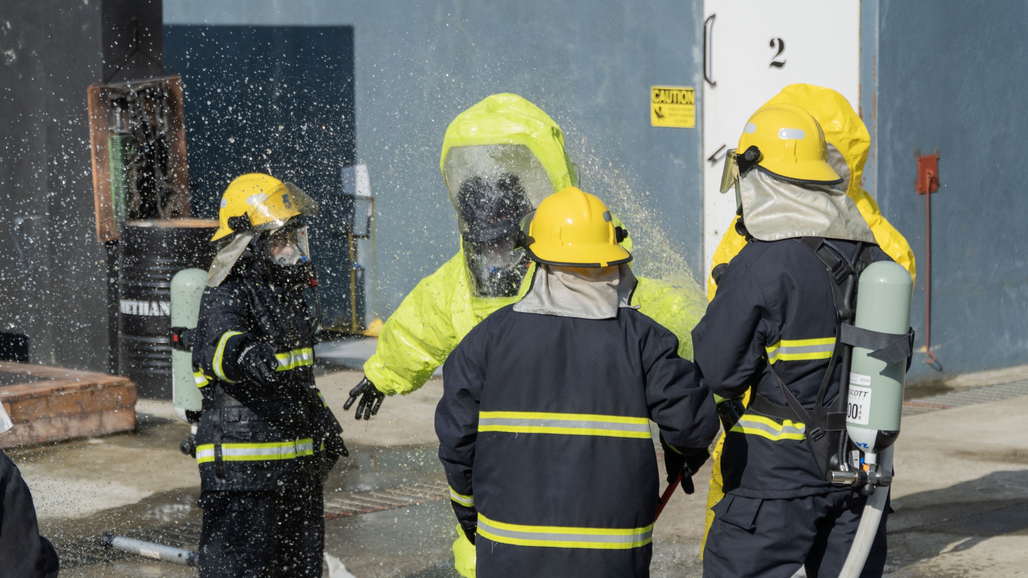 Trainees wearing self-contained breathing apparatus