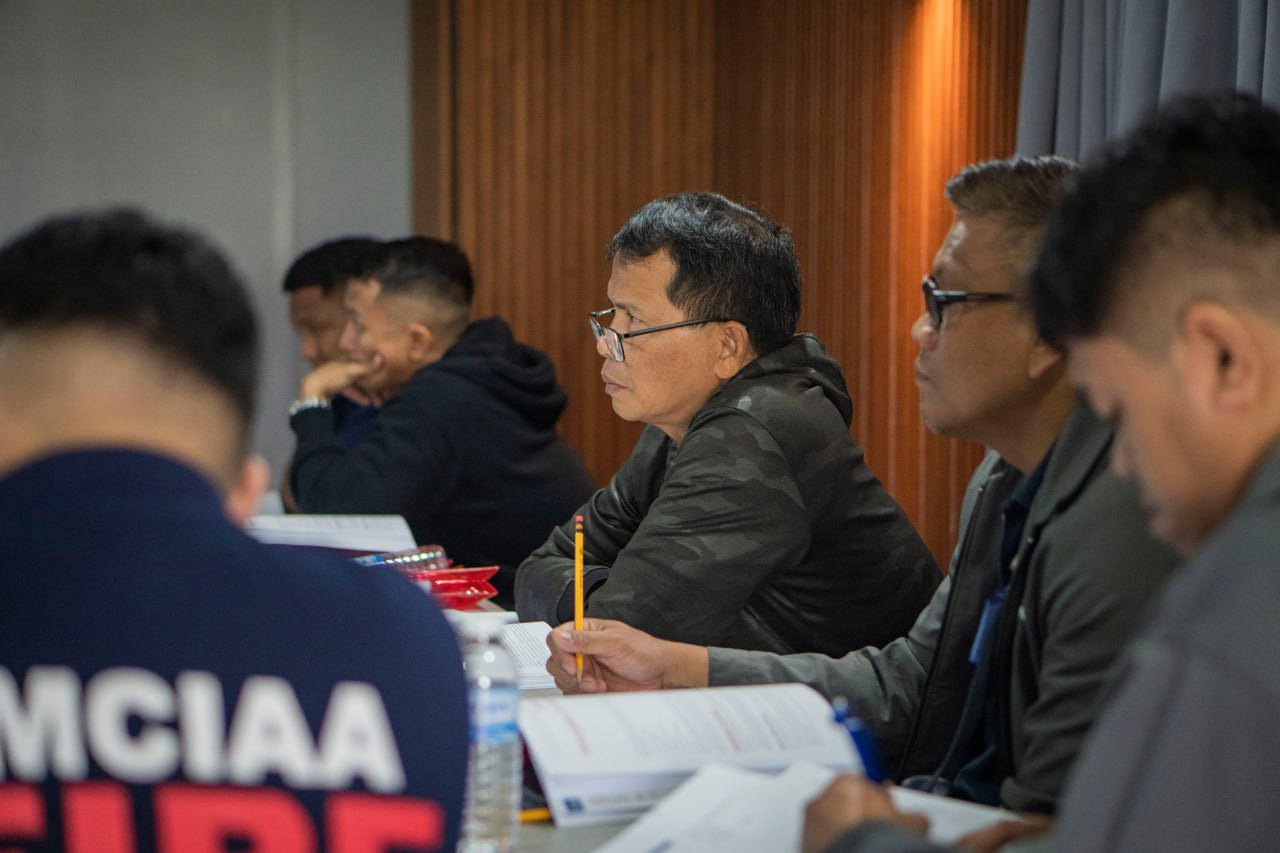 Participants engaged in focused classroom learning at COMPASS Safety Institute