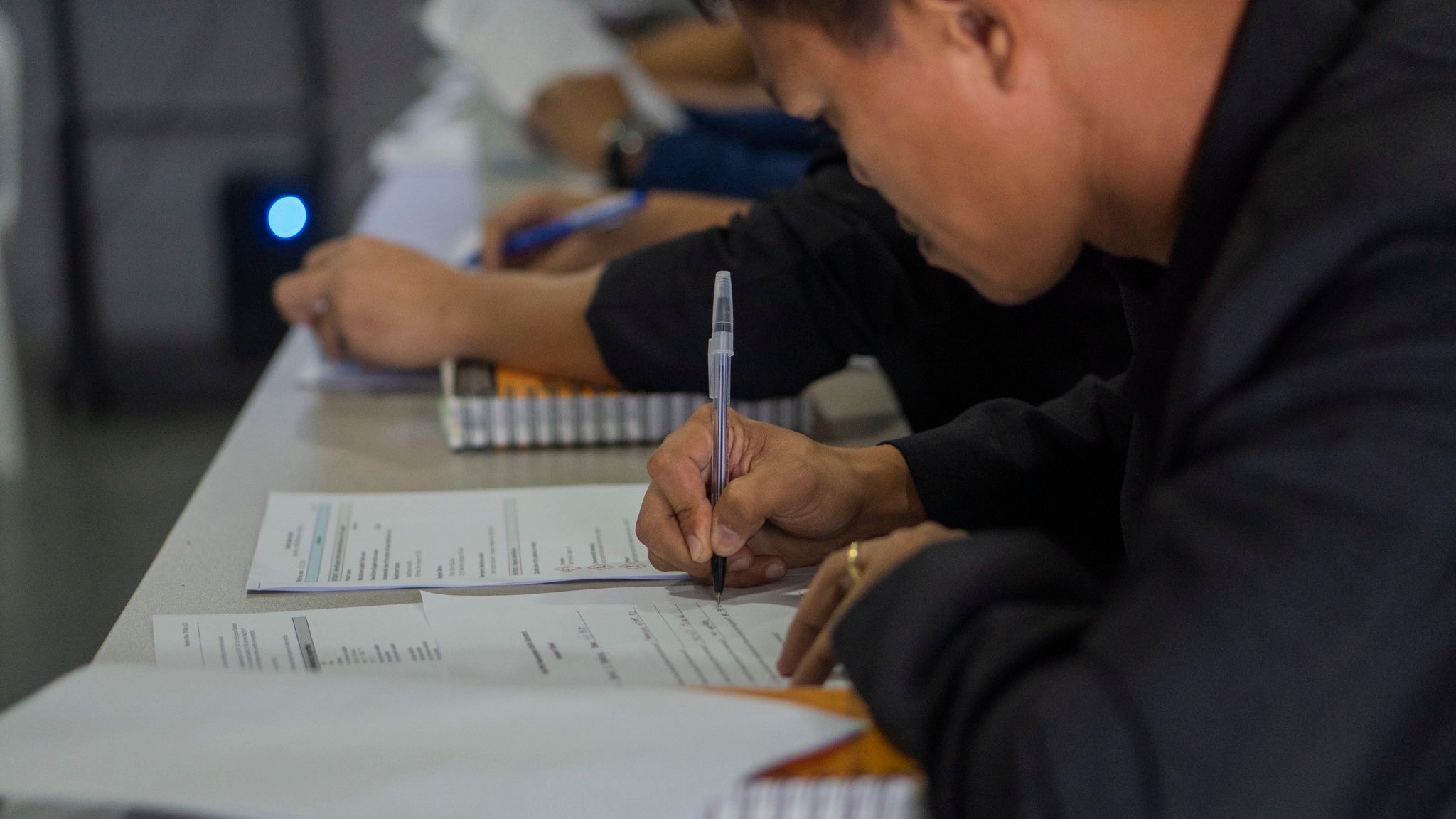 CSI participant completing a written assessment